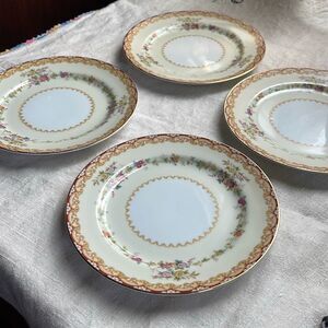 Lot of 4 Noritake China Dimity pattern bread plates.